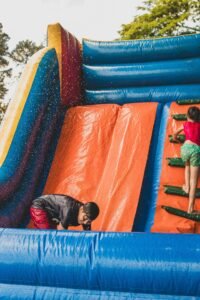 Water Slide Rental vs. Bounce House: Which Is Better for Your Party?